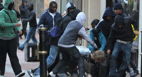 migrants beating up white